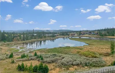 an aerial view of a lake in a field at Stunning Apartment In Lillehammer in Lillehammer