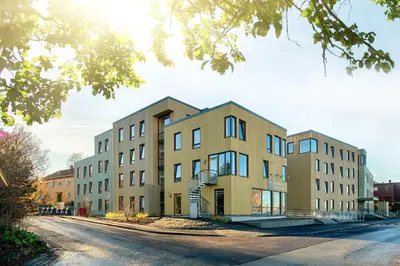an apartment building on the side of a street at Rumi Hostel in Trondheim