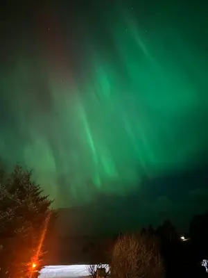 an image of the northern lights in the sky at Flemsøy in Ålesund