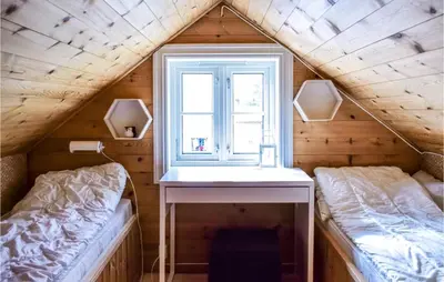 a small room with a sink and a window at 2 Bedroom Cozy Home In Vallavik in Kaland
