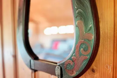 a close up of a mirror on a wall at Voss Waterfalls - Norway Mountain Cabin & Traveller Award Winner! in Vossevangen