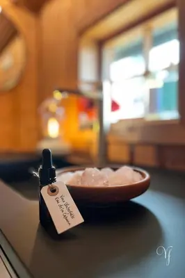 a bottle of soap sitting next to a bowl of food at Voss Waterfalls - Norway Mountain Cabin & Traveller Award Winner! in Vossevangen