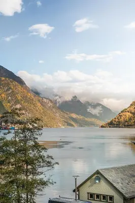 a view of a lake with mountains in the background at Odda Panorama in Odda