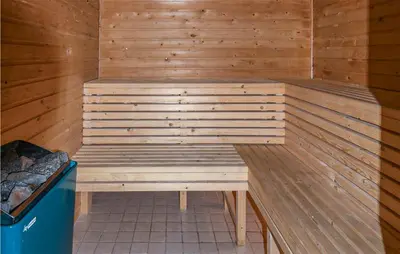 a wooden sauna with a wooden bench in it at Gorgeous Home In Hemsedal With Sauna in Hemsedal