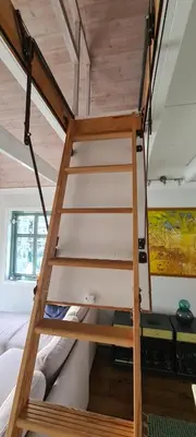 a loft bed in a tiny house at Exceptional Cottage 2 meters from the sea, possible to rent boat, Bekkjarvik, 60 km from Bergen in Gauksheim
