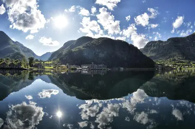 a view of a lake with mountains in the background at Fully equipped cabin by the fjord in Volda