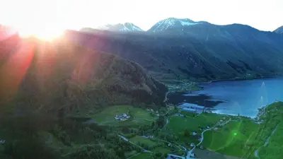 an aerial view of a valley with a lake and mountains at Fully equipped cabin by the fjord in Volda
