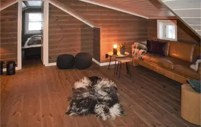 a living room with a couch and a table at Pet Friendly Home In Gol With Sauna in Gol