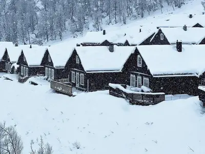 a house covered in snow at 7 person holiday home in Rauland-By Traum in Rauland