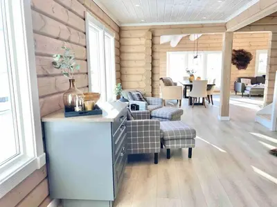 a living room with a couch and chairs and a table at Large and luxurious family cabin in Myrkdalen in Helgatun
