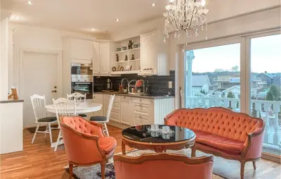 a living room with a couch and a table at 1 Bedroom Nice Apartment In Hamar in Hamar