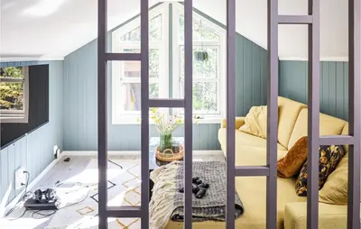 a room with a bed and a ladder at Beautiful Home In Hebnes With Kitchen in Hebnes