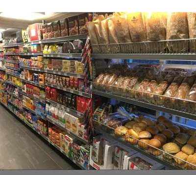 a grocery store aisle filled with lots of food at Tangen - cabin with 4 bedrooms - great nature in Norheimsund