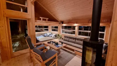 an overhead view of a living room with a wood stove at Heimstølen - Cabin at Sørbølfjell in Flå