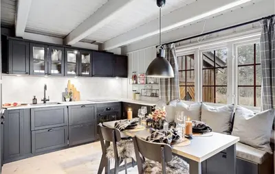 a kitchen with a table and chairs in a room at 4 Bedroom Nice Home In Rauland in Rauland