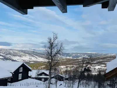 a view from a house in the snow at Geilo-Kikut, Ski-In, Ski-Out with Stunning Trails and Perfect Location in Geilo