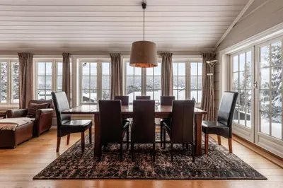 a dining room with a table and chairs at Spacious detached house of 209 sqm in the heart of Geilo in Geilo