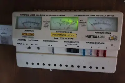a control panel with different types of wires at Cozy log cabin at beautiful Nystølsfjellet in Gol