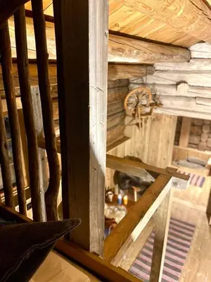 an attic of a log cabin with a ceiling at Sauefjøset - Idyllisk gardstun fra 1800-tallet in Skjåk