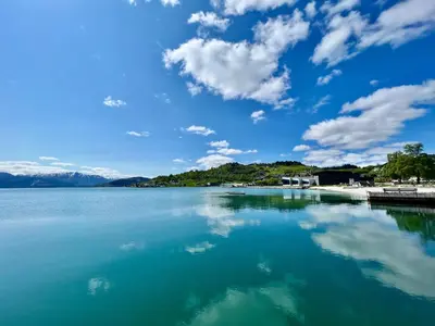 a view of a large body of water at Hardangerfjord View - luxury fjord-side holiday home in Øystese