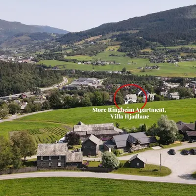 an aerial view of a home in a village at Store Ringheim Apartment - Villa Hjadlane in Vossevangen