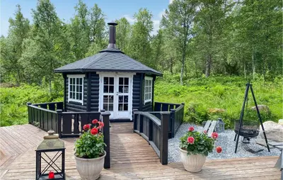 a black and white gazebo on a wooden deck at 3 Bedroom Gorgeous Home In Molde in Molde