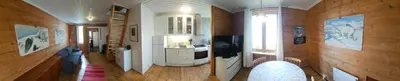 a bathroom with a sink and a tv in a room at Leilighet v Hardangerfjorden in Hesthamar